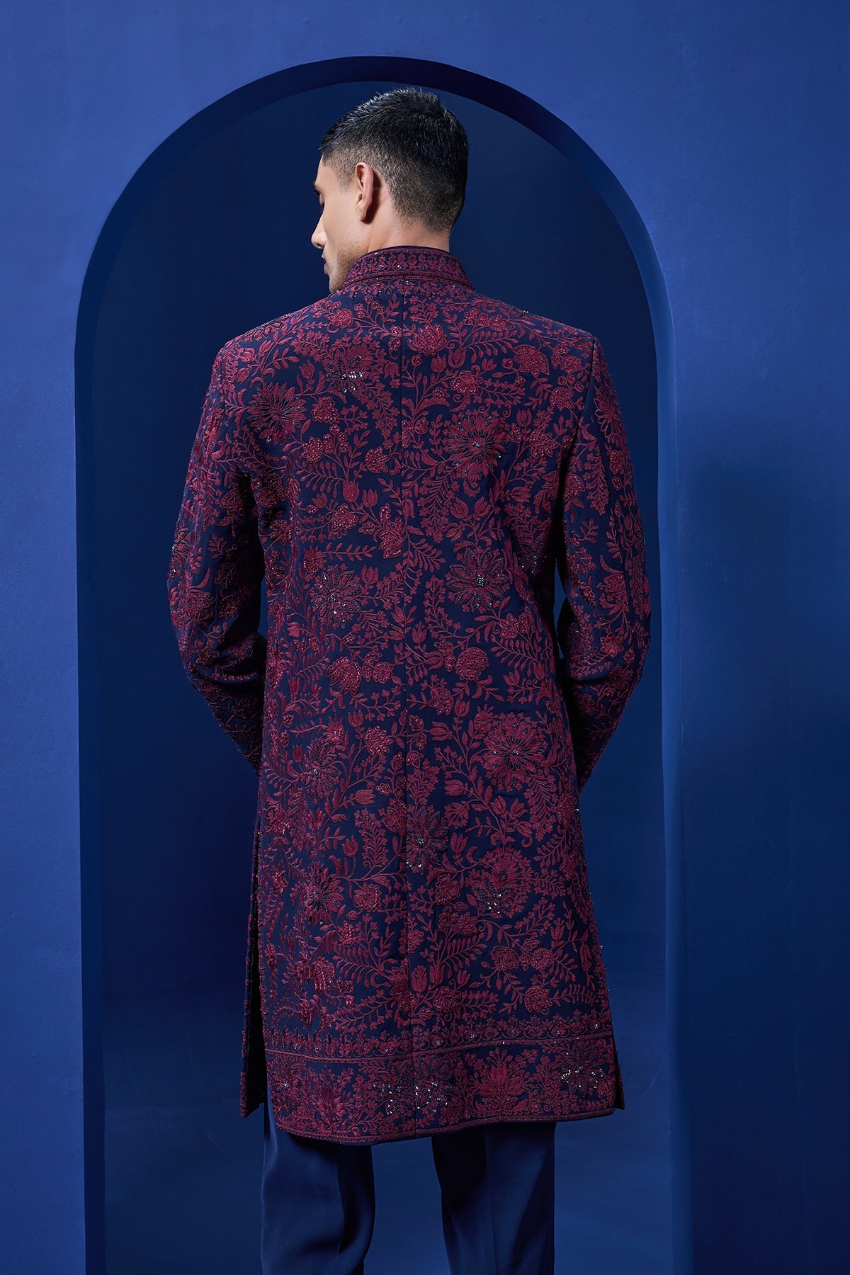 Navy blue Indo Western highlighted with sequins pearls and wine thread work