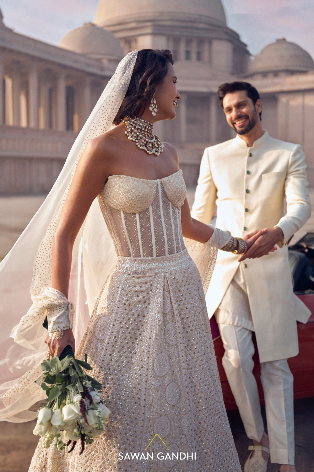 IVORY SHERWANI WITH EMERALD ACCENTS