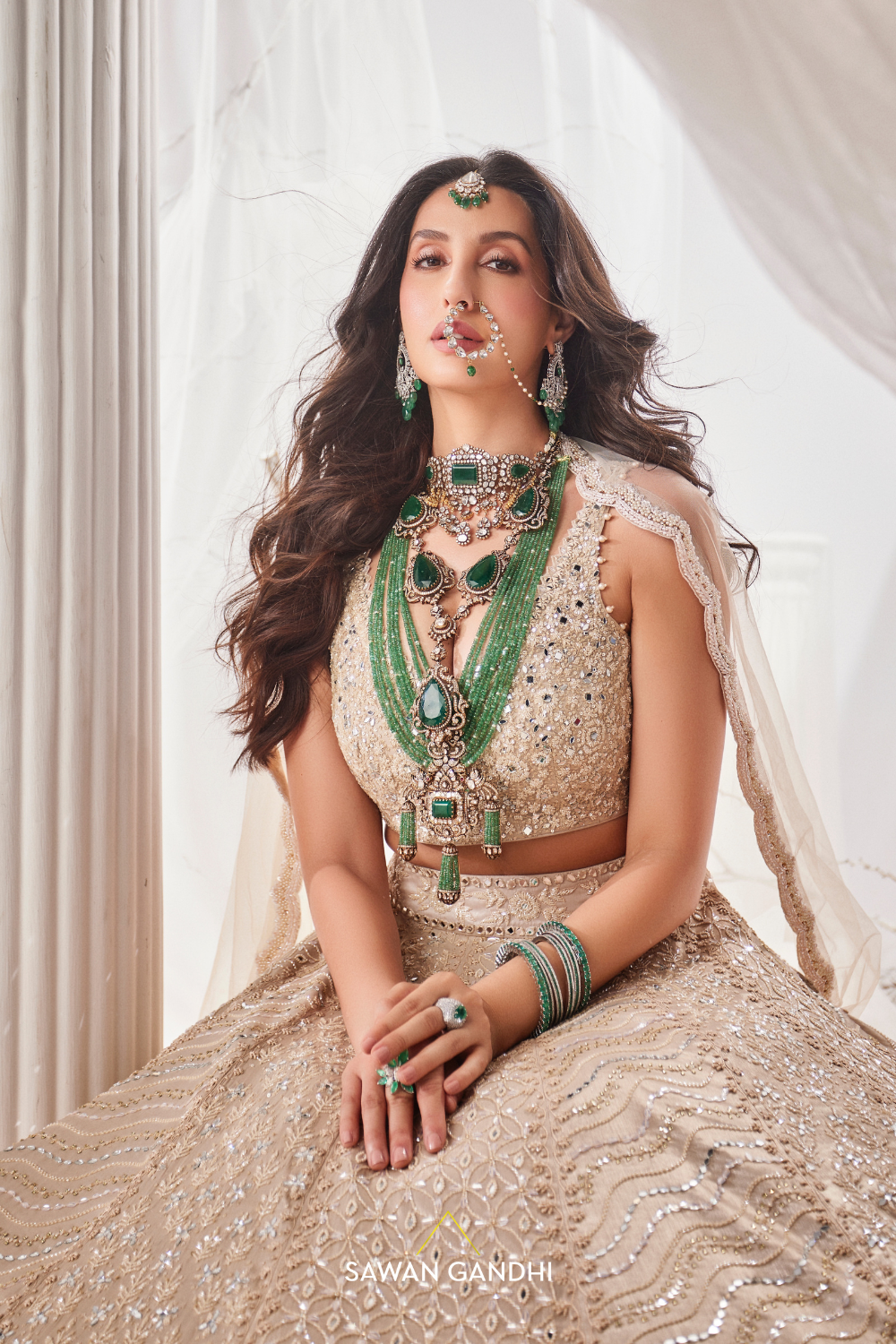 Nora Fatehi in Gold beige beadwork lehenga