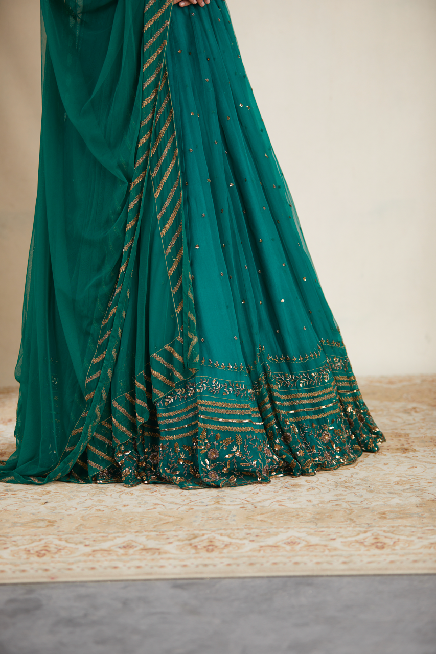 TEAL GREEN ANTIQUE SEQUENCE WORK LEHENGA SET