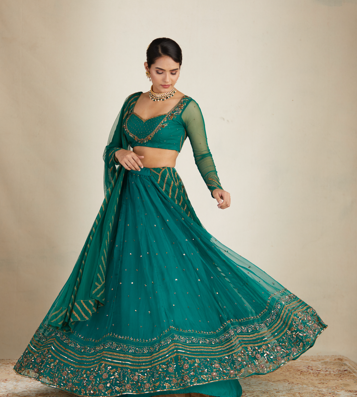 TEAL GREEN ANTIQUE SEQUENCE WORK LEHENGA SET