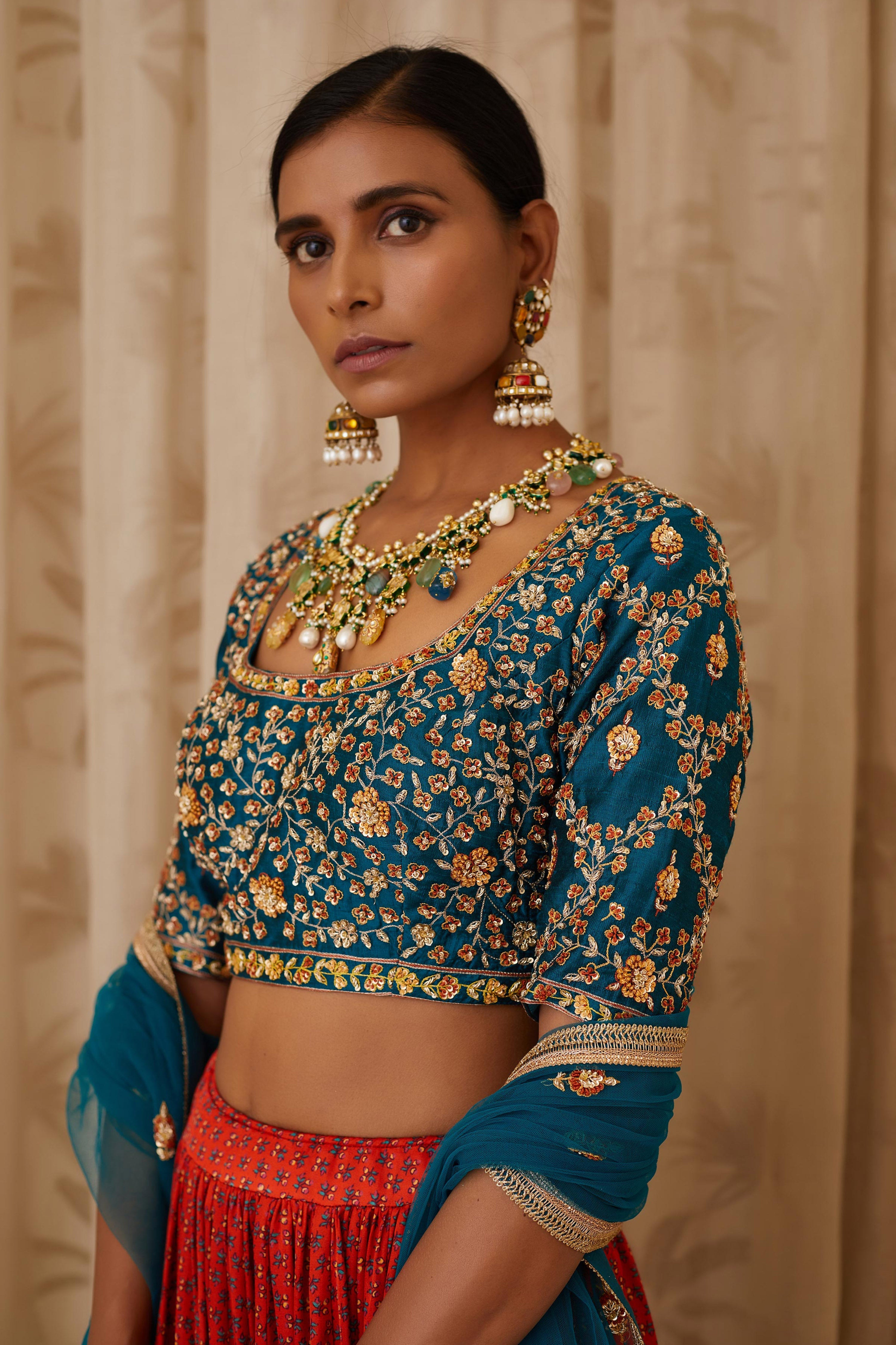 Teal Blue and Burnt Orange Lehenga Set