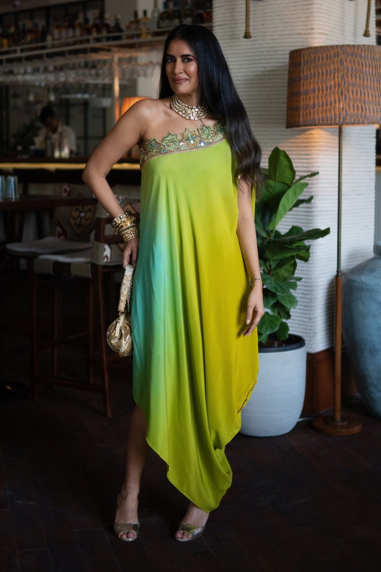 Alisha Pekha in Swastika One Shoulder Dress