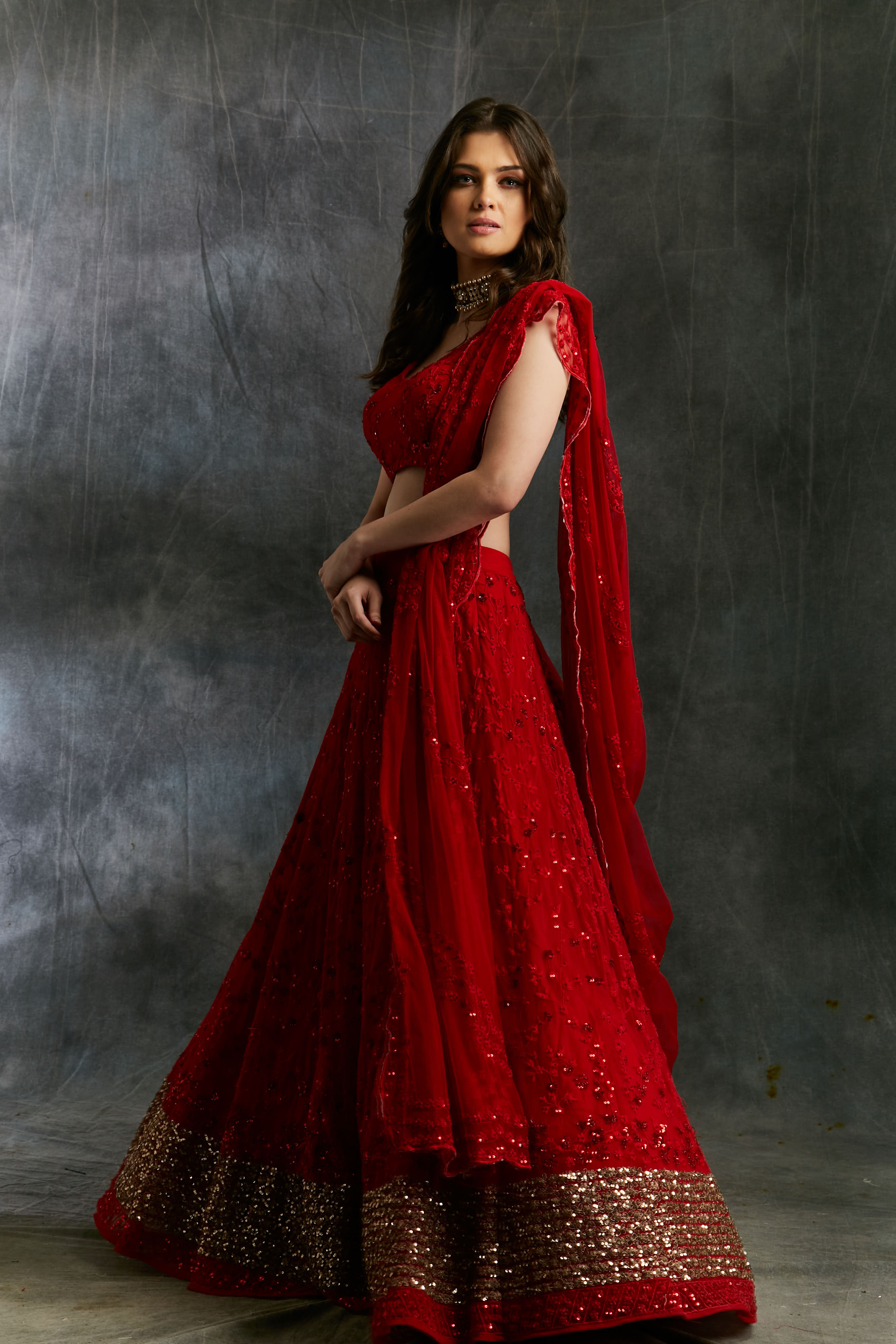 Red Sequins Lehenga With Gold Border