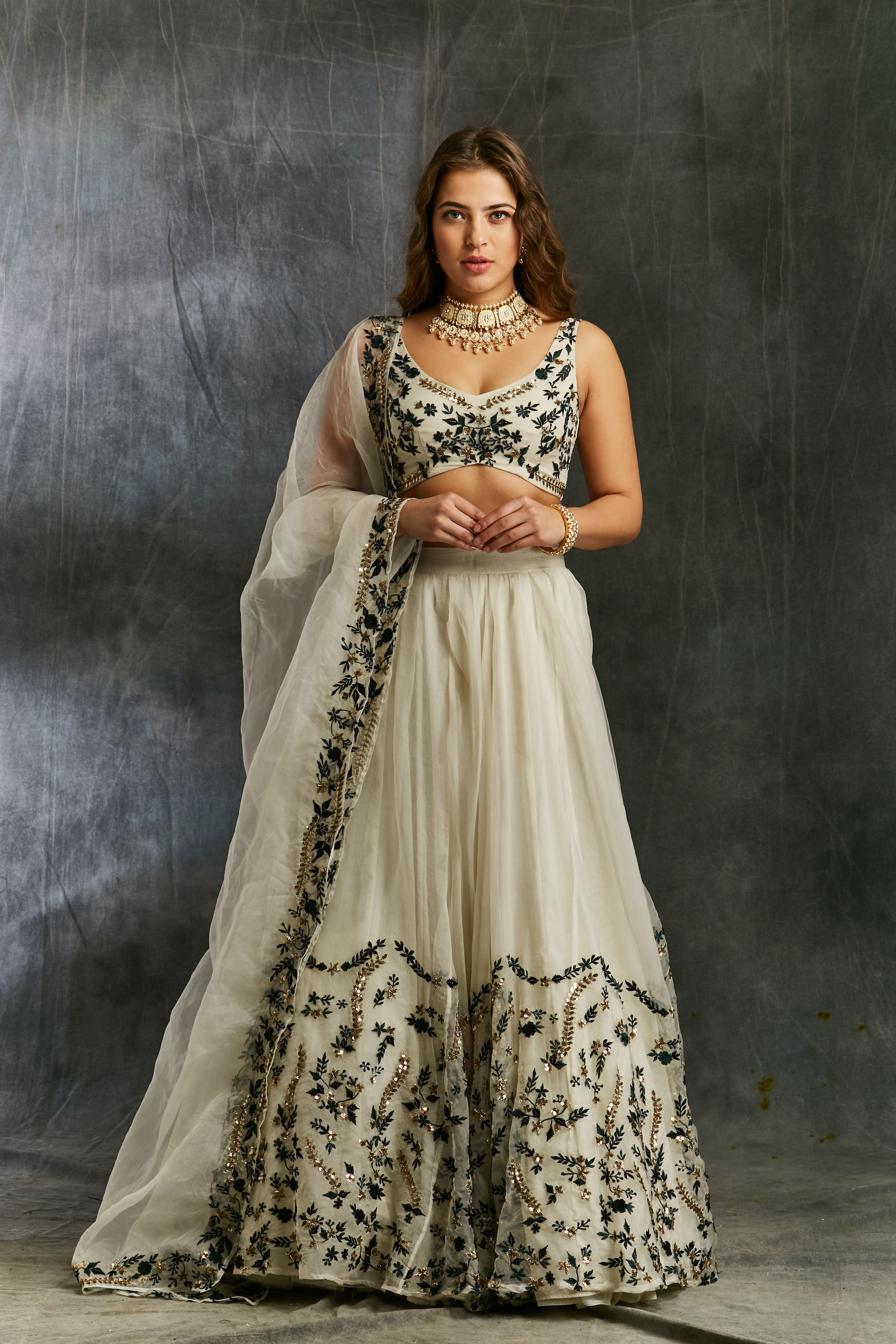 White Organza With Green And Black Threadwork Lehenga