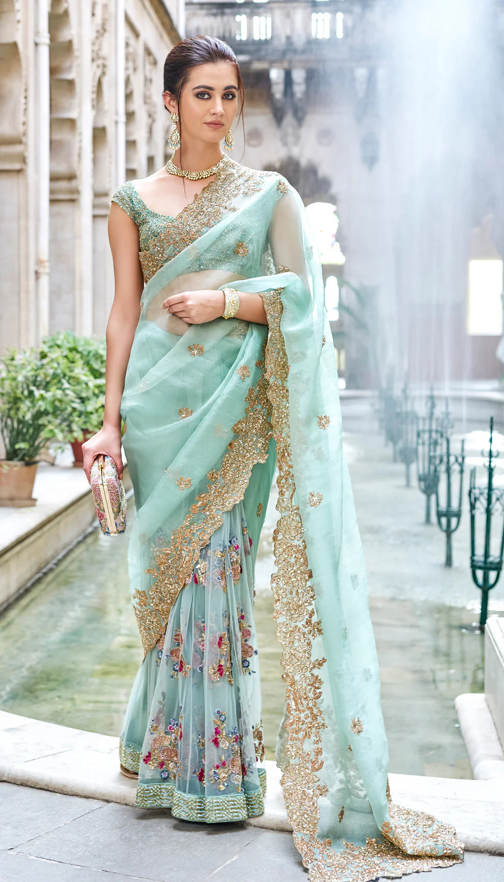 Mint Organza Saree with Delicate Peeta Embroidery and Coral Rosettes