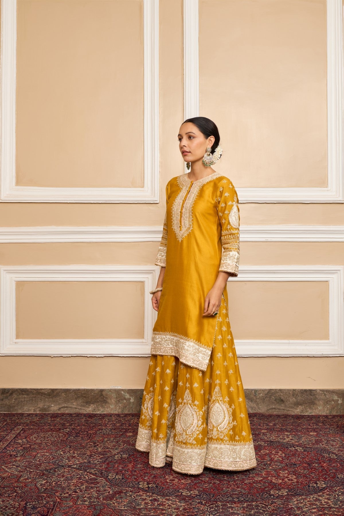 Muskan Chanana In RAINA - GLAZE MUSTARD SHORT KURTA WITH SHARARA AND ODHNI