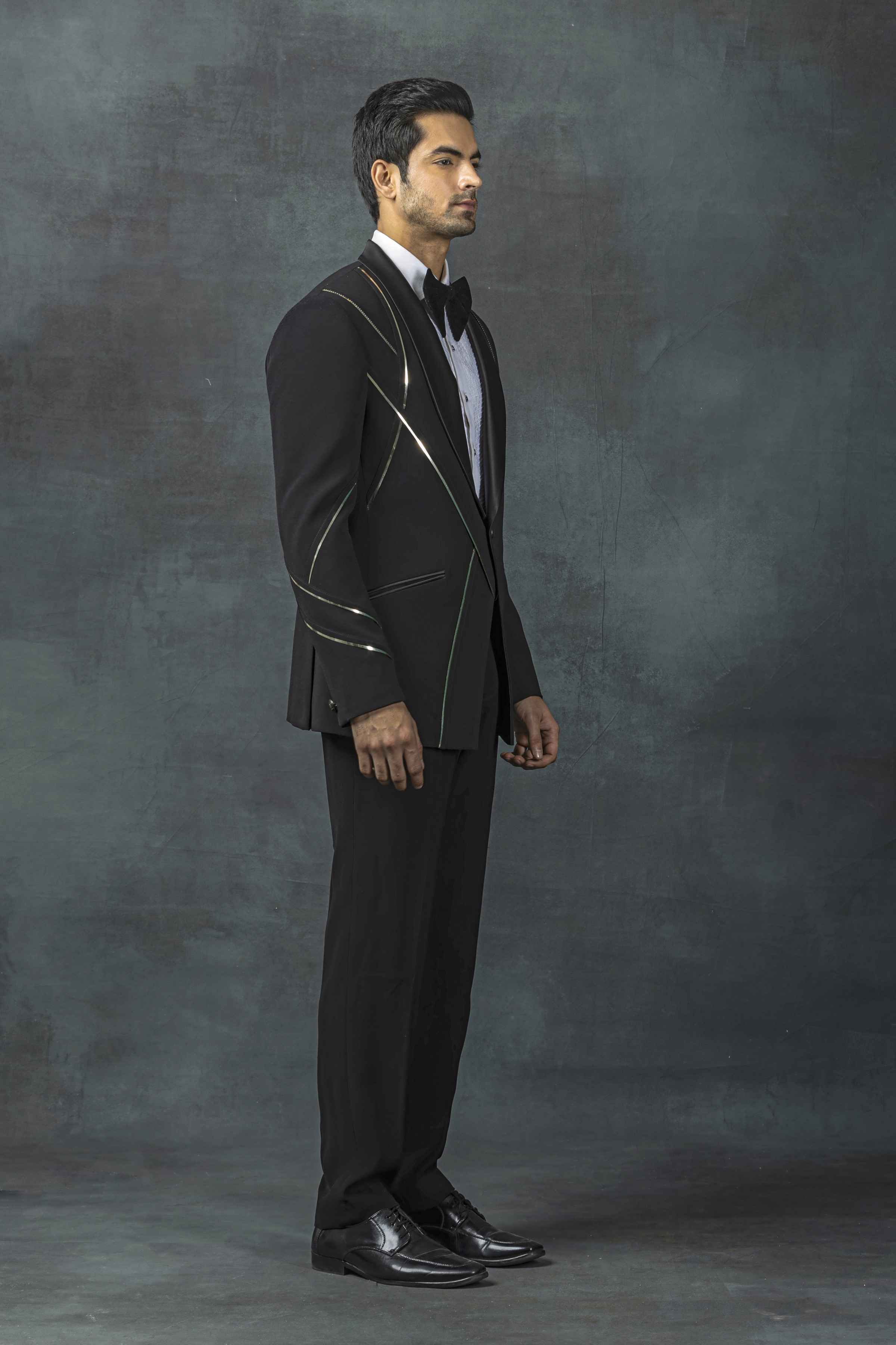 Black Tuxedo With Golden Reel Detailing
