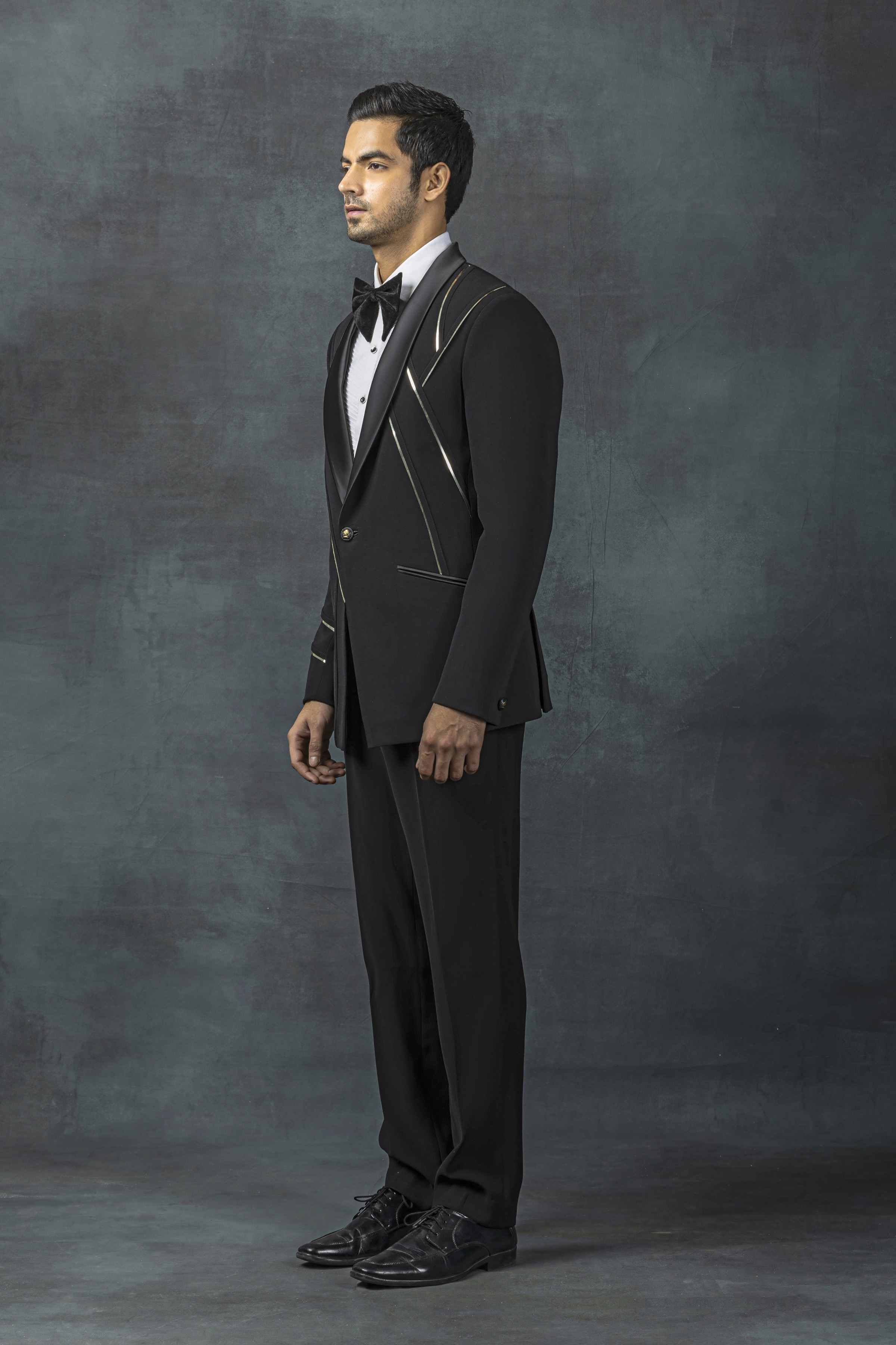 Black Tuxedo With Golden Reel Detailing