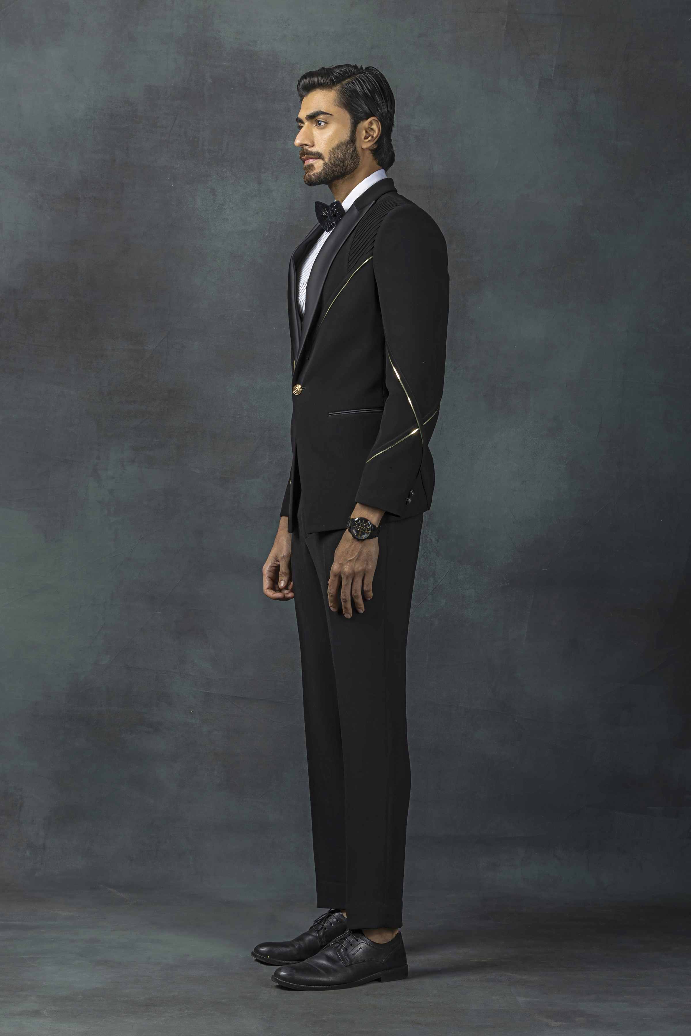Black Tuxedo With Golden Reel Detailing