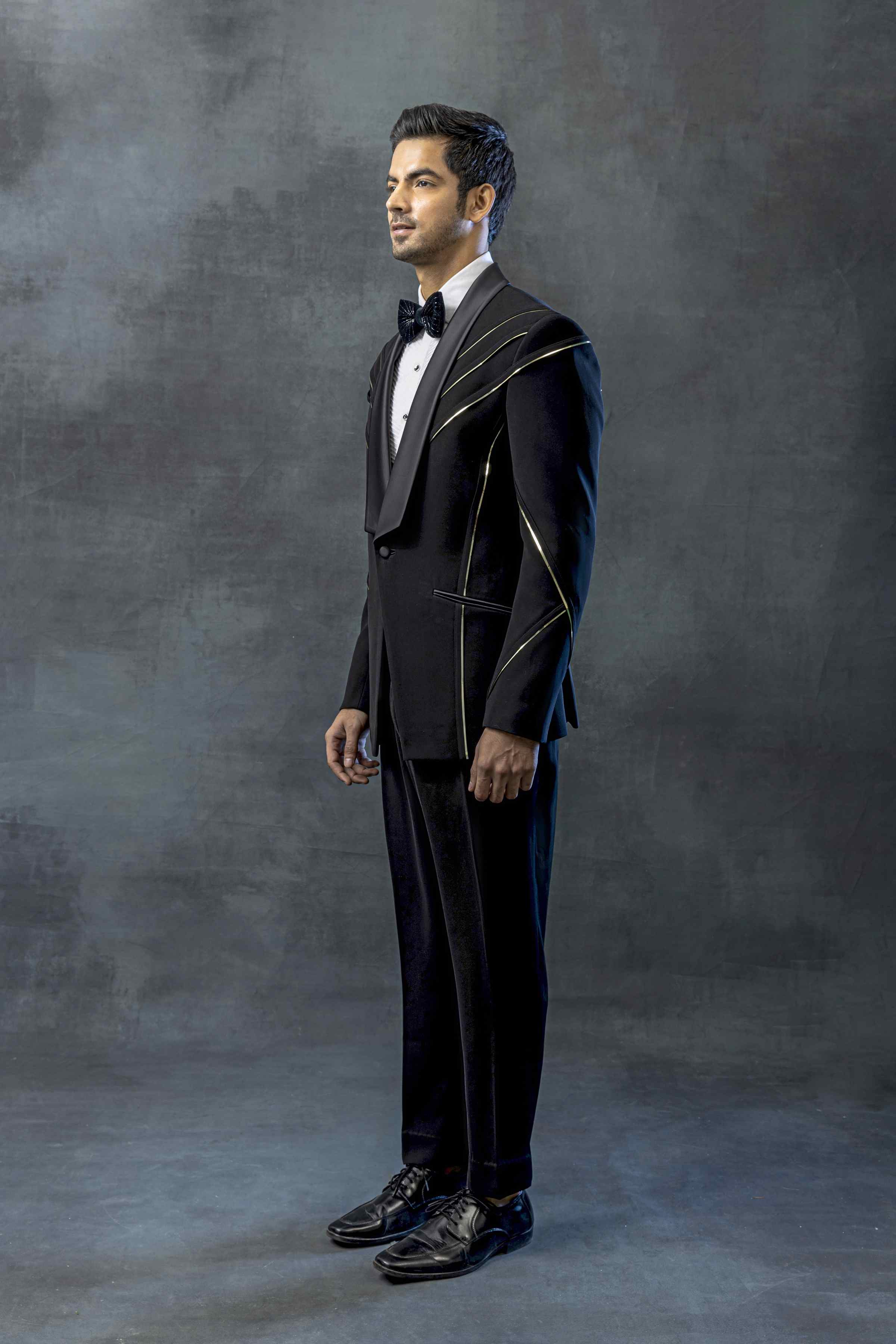 Black Tuxedo With Golden Reel Detailing