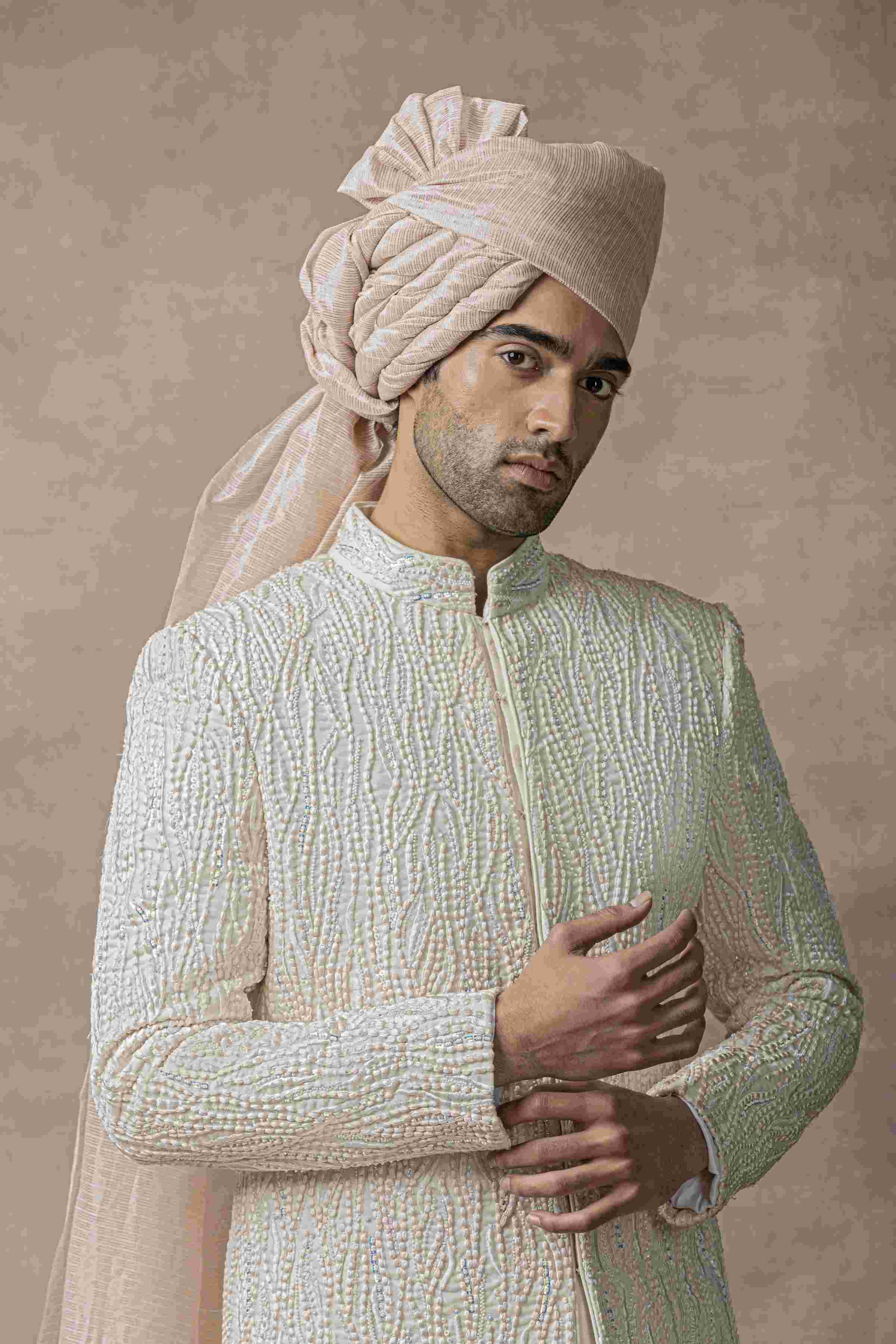Off White Sherwani Highlighted With Thread , Pearl And Multi Coloured Sequin
