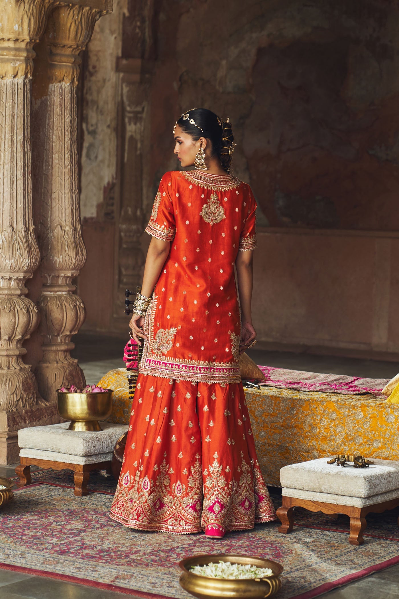 ANJALI KHUSHALANI IN AREESHA - BURNT ORANGE SHORT KURTA WITH SHARARA AND DUPATTA