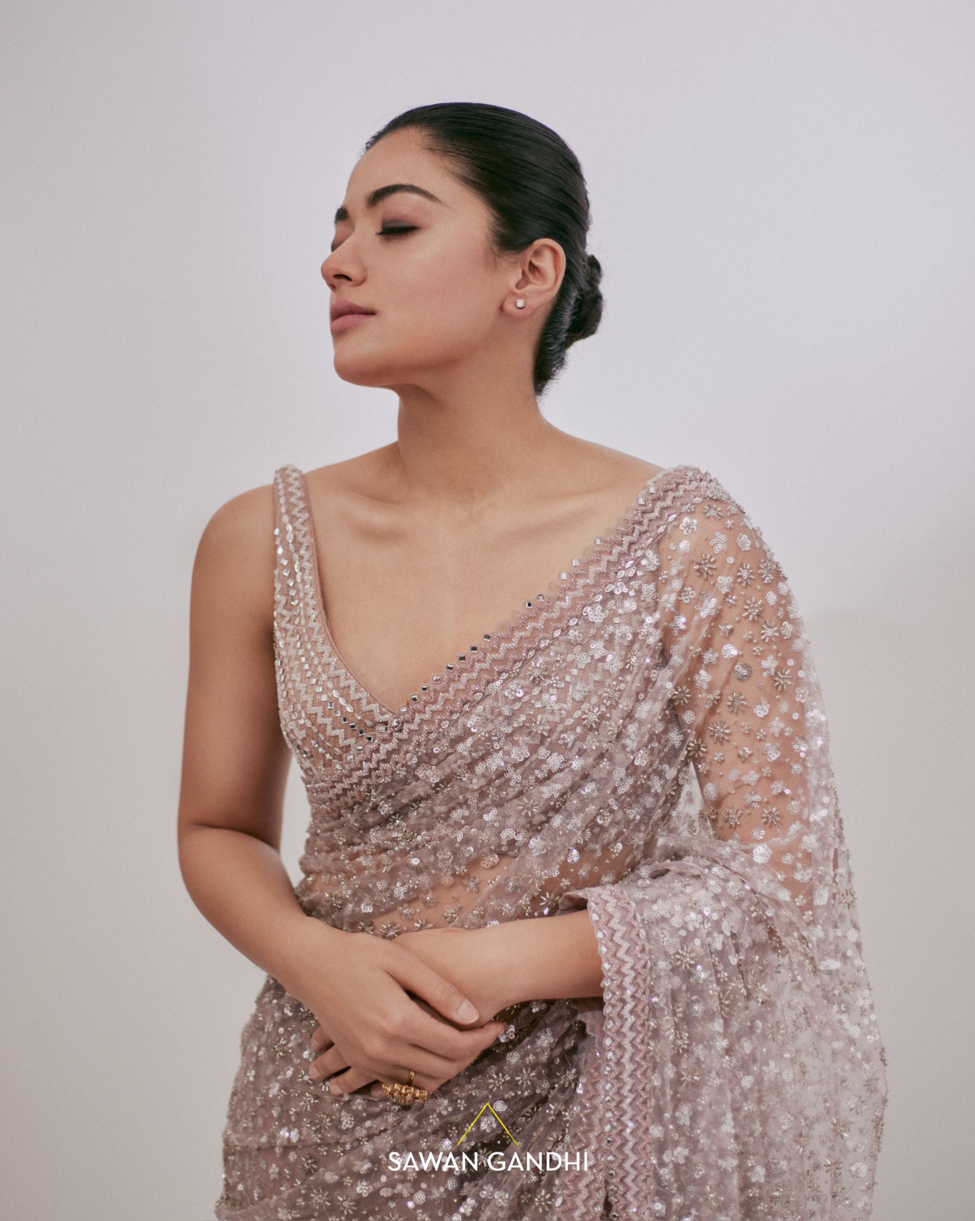 Rashmika Mandanna in Blush pink sequins andcutdana saree